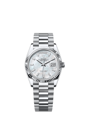 The Oyster Perpetual Day-Date 36 in platinum with a diamond-set white mother-of-pearl dial, fluted bezel and President bracelet. -m128236-0021