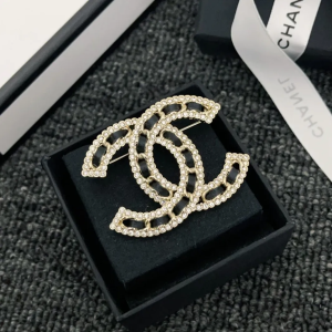 CC brooch pines