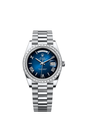 The Oyster Perpetual Day-Date 40 in platinum with a gradient blue dial, diamond-set bezel and President bracelet. -m228396tbr-0042