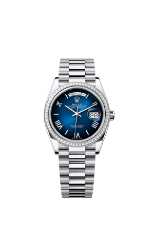 The Oyster Perpetual Day-Date 36 in platinum features a gradient blue dial, a diamond-set bezel and a President bracelet. -m128396tbr-0021